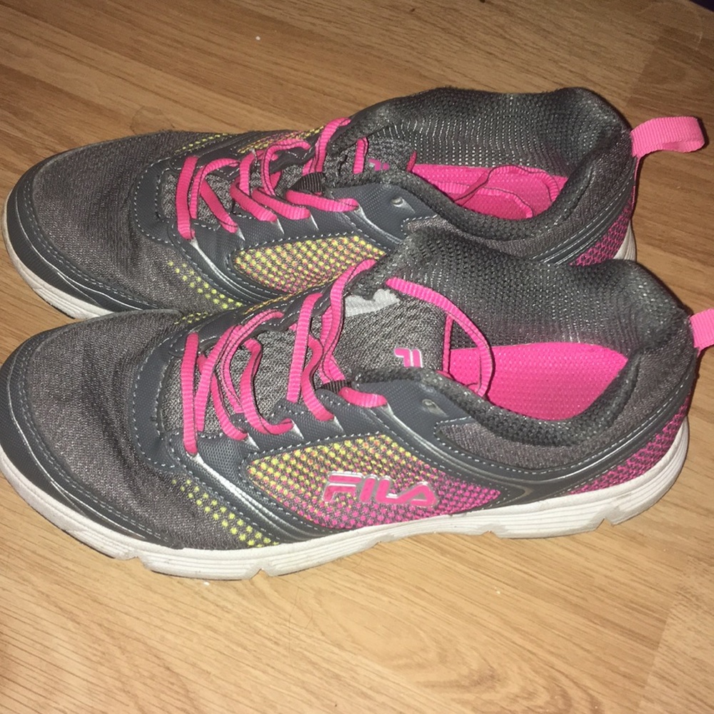 Pink and grey Fila running shoes